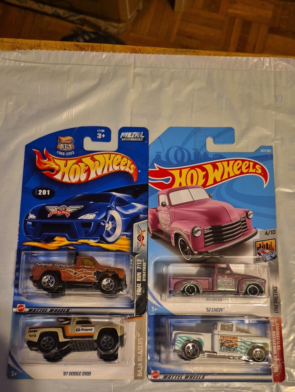 D6  Hot  Wheels assorted trucks   Lot Of 4